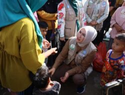 Kak Na Mengobati Luka dan Menguatkan Hati Korban Banjir